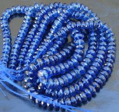 the beads are blue and shiny