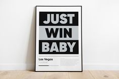 a black and white poster with the words just win baby written in bold font on it