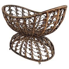 a basket that is made out of wicker and has an intricate design on it