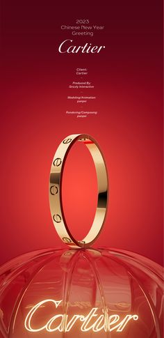 an advertisement for cartier's new year's eve collection, with the word cartier illuminated in gold