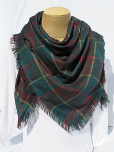 "The green and brown plaid, this Ontario tartan blanket scarf makes a great accent to the wonderful winter coat you have or wear it to top off that sweater you feel so comfortable in.  It makes a great oversized scarf gift for that special lady on your list. Be practical and wear this to keep out the brisk breeze or use it to dress up your outfit.  This big 56\" x 56\" poly viscose tartan scarf has a 2\" fringe and is washable.  If you would like to be sure of the color or match for your occasio Tartan Blanket Scarf, Clan Macleod, Tartan Blanket, Tartan Scarf, Tartan Fabric, Plaid Blanket, Oversized Scarf, Over Size, Scarf Gift