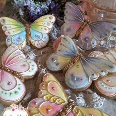 some colorful butterflies are sitting on a table