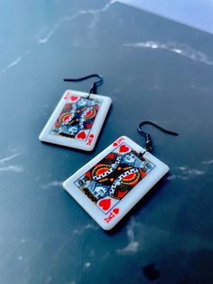 The perfect accessory to show off your favorite singer!  Made with stainless steel earrings posts. Album Cover Portrait, Hearts Playing Cards, Reputation Era, King Of My Heart, Steel Earrings, Etsy Earrings Dangle, Stainless Steel Earrings, Charm Earrings, Post Earrings