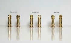 four different types of brass faucets on a white surface, with the words commere port middle post middle post end post and middle post