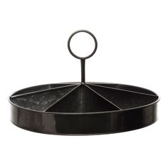 a black metal tray with a ring on the top and bottom, sitting in front of a white background