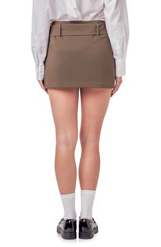 A belted waist brings polished style to a crisp skort featuring inner shorts for comfortable coverage as you go about your busy day. 95% polyester, 5% spandex Hand wash, dry flat Imported Belted Fitted Mini Skirt Skort, Fitted Belted Mini Skort, Fitted Mini Skort With Belt, Fitted Mini Skirt Skort With Belt, Belted Fitted Skort For Workwear, Belted Fitted Mini Shorts, Fitted Belted Mini Shorts, Fitted Belted Mini Length Shorts, Fitted Mini Shorts With Belt Loops