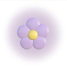 a purple and yellow flower floating in the air