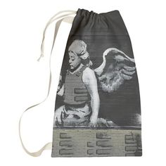 a drawsack bag with an angel painting on it