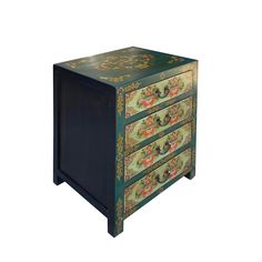 an ornately painted dresser with drawers