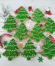 christmas cookies decorated with green and white icing