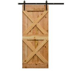 an open wooden door with black hardware on the top and bottom bars hanging from it's side