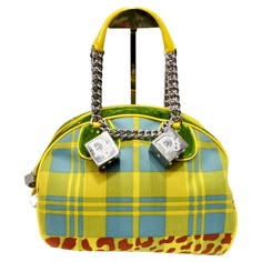 Introducing the Christian Dior Fall 2004 Gambler Dice Bowler Bag, a stunning creation by John Galliano for Christian Dior that exudes luxury and statement style. Crafted with meticulous attention to detail, this bowler-style top handle bag is a true masterpiece. The bag features a captivating contrast of yellow and blue plaid with hints of red leopard print and lush green velvet, creating a striking visual impact. The combination of textures and patterns adds depth and dimension to the design, s Custom Designer Bags, John Galliano Dior Bag, Botas Louis Vuitton, Cool Purses, Galliano Dior, Vintage Thrift Stores, Bowler Bag, Gucci Dress, Dior Logo