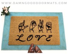 a door mat with the words love written on it