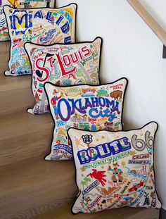 four pillows with the words, your happy place and hand - embroidered with catstudio