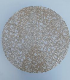 an intricately designed table top on a white surface with no one around it or someone else