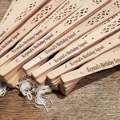 a bunch of wooden spoons sitting on top of a table