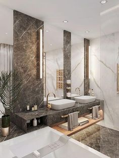 a bathroom with two sinks, mirrors and a bathtub in it's center