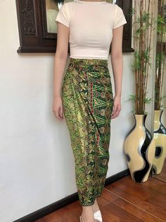 Green Gold Ethnic Bali Batik Wrap Skirt HOW TO STYLE: This is instant wrap skirt, very easy to style.  You can wear this batik wrap skirt from day to night, as a beach cover up or style it with a top for a formal event. You can even turn this skirt into a beautiful dress.  Perfect for Bridesmaid Gift, Valentine's Day Gift, Mother's Day Gift, Birthday Gift for Her. MATERIALS: Cotton Batik with Bird Motif Batik was handcrafted by our local artisans Self Manufactured  Size inclusive❗️Contact us for Bohemian Long Sarong With Batik Print, Traditional Long Wrap Skirt For Beach, Traditional Skirt Bottoms For Beach, Traditional Beach Skirt, Traditional Skirt For Beach, Traditional Long Sarong For Beach, Traditional Long Skirt For The Beach, Traditional Long Skirt For Beach, Traditional Long Beach Skirt