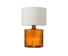 an orange glass table lamp with a white shade on the top and bottom part of it