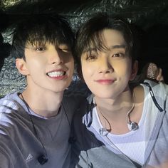 two young men taking a selfie together