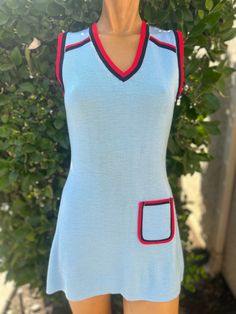 Here is a vintage 1970s knit Tennis Dress. Made by," What a Racquet".Size Medium .Bust 34", waist 28",hips 42", from top of shoulder to hem 30". Pulls over your head.Baby blue knit with red and navy blue trim.Nice vintage condition 70s Female Fashion, 80's Clothes, Vintage Halter Dress, Vintage Dress Blue, 1970 Dress, 80s Outfit, Womens Sports, Blue Trim, 1960s Fashion