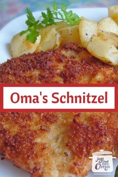 there is a piece of fish and potatoes on the plate with words that read oma's schnitzel