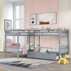 a child's bedroom with bunk beds and pink walls