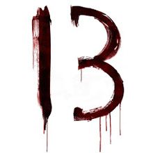 the letter b is painted with red paint and dripping from it's lower letters