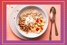 a white bowl filled with oatmeal and fruit on top of a table