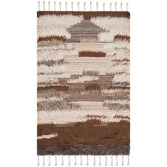 a brown and white rug with fringes on it