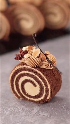 a piece of chocolate cake with nuts on top