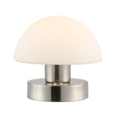 a white light sitting on top of a metal stand