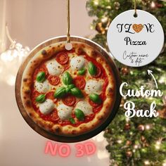 a pizza ornament hanging from a christmas tree