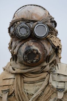 a man wearing a gas mask and goggles