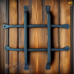 a wooden wall with metal bars on it