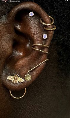 a woman with ear piercings on her ears