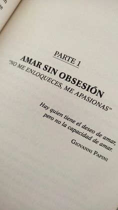 an open book with the words amar sin obsesion written in black on it