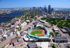 an aerial view of a baseball stadium in the city