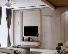 a bedroom with a large bed and a flat screen tv mounted on the wall above it