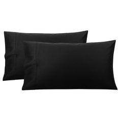 two black pillow cases sitting next to each other