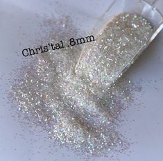 white glitter in a glass container with the words christal 3mm