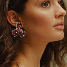 In a color palette reminescent of 60's architecture and fashion, these artful stud earrings combine organza, sequins, and three-dimensional beadwork for an intricate floral bloom. Spring Party Petal-shaped Earrings, Spring Party Earrings With 3d Flowers, Pink Flower Earrings For Evening, Spring Evening Flower Earrings, Summer Party 3d Flower Earrings, Spring Party Flower Earrings With 3d Flowers, Spring Party 3d Flower Earrings, Handmade Flower Earrings For Party, Multicolor Flower Earrings For Spring Party