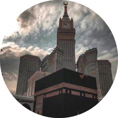 an image of a clock tower in the middle of a city with clouds above it