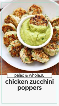 chicken zucchini poppers with guacamole in the middle on a white plate