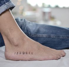 a person's foot with the word sleep written on it and three small stars