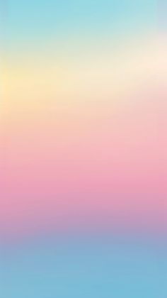 an abstract blurry background with blue, pink, and yellow colors in the sky