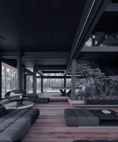 a living room filled with black furniture and lots of trees in the backround