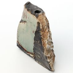 a piece of art that looks like a rock