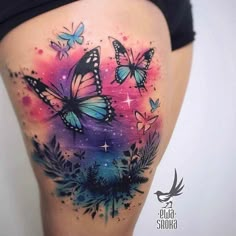 a woman's thigh with butterflies on it and stars in the sky behind her