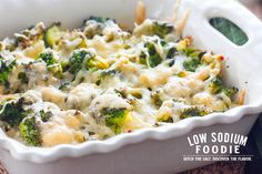 a casserole dish filled with broccoli and cheese